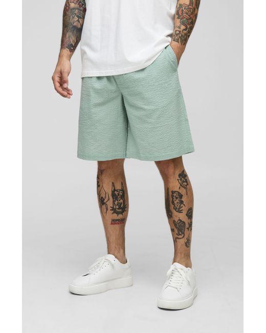 BoohooMAN Green Elasticated Baggy Plain Seersucker Shorts for men