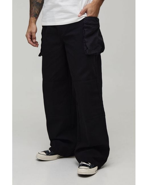 BoohooMAN Black Baggy Fit Elasticated Bellow Pocket Cargo Trousers for men