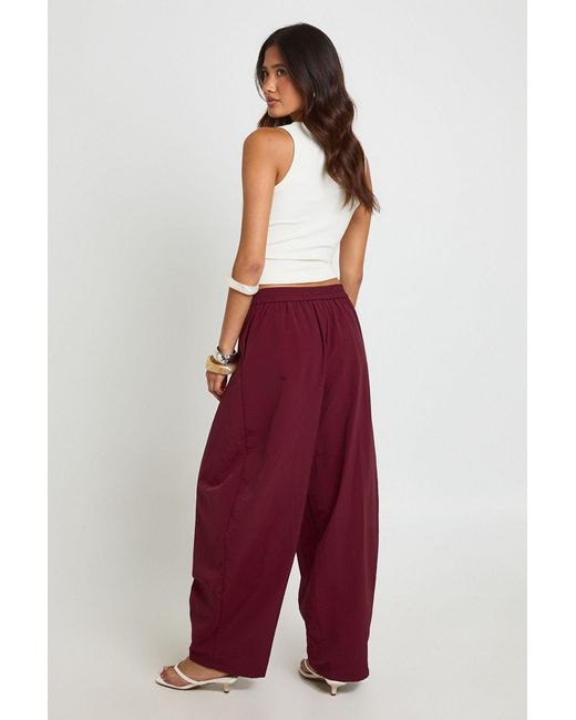 Boohoo Red Nylon Pleat Front Barrel Trousers