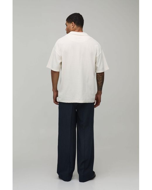 BoohooMAN Blue Baggy Fit Pinstripe Pleat Front Tailored Trousers for men