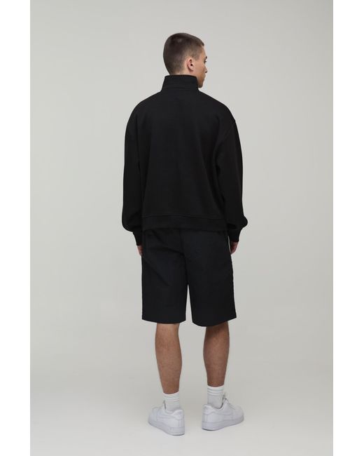 BoohooMAN Black Baggy Long Length Contrast Stitch Nylon Short for men