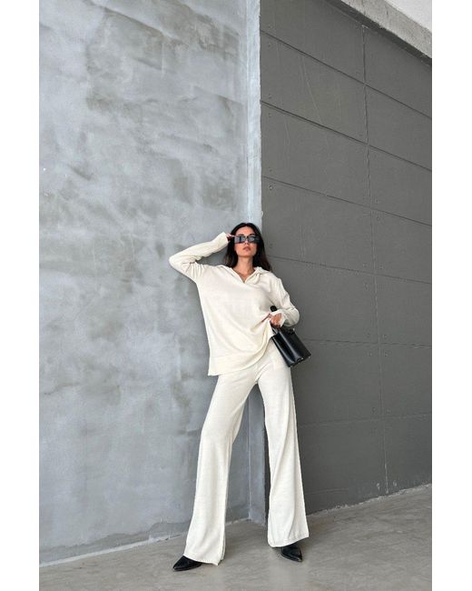 Hiccup Green 2 Pieces: Knitted Sweater With A Zippered Neck & Mid Rise Wide Leg Trousers
