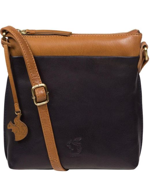 Conkca Black 'Nikita' & Dark Tan Leather Cross Body Bag