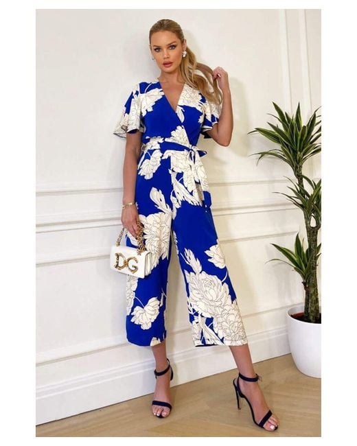 AX Paris Blue And Cream Floral Printed Butterfly Sleeve Belted Jumpsuit