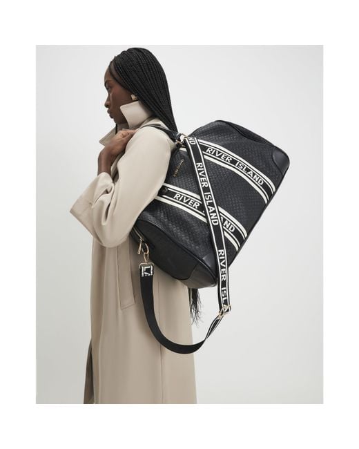 River Island Black Webbing Front Monogram Barrell Bag Pu