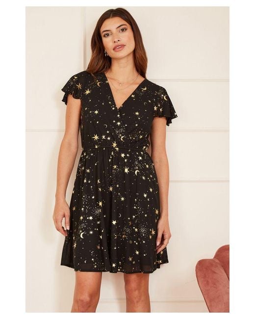 Mela London Black Foil Star Print Wrap Skater Dress