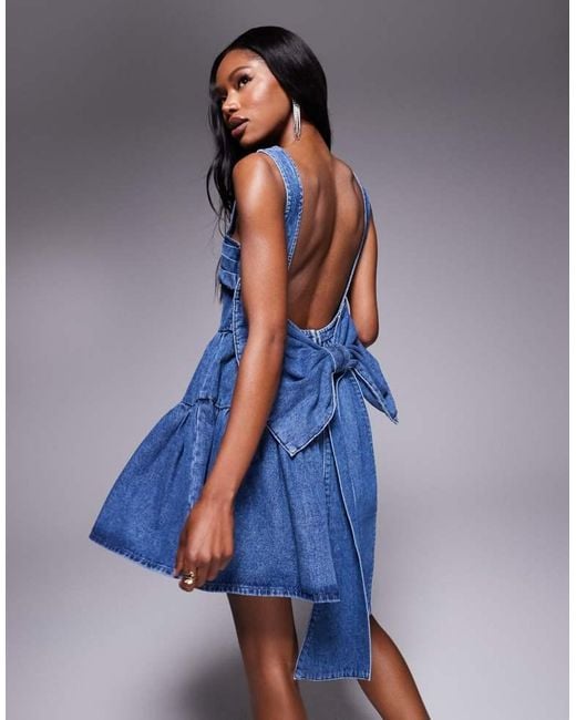 asos blue skater dress ASOS LUXE jacquard one shoulder skater mini dress with corsage detail in blue floral