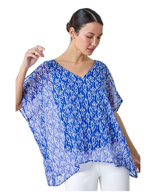 Roman Blue Abstract Print V-Neck Overlay Tunic Top