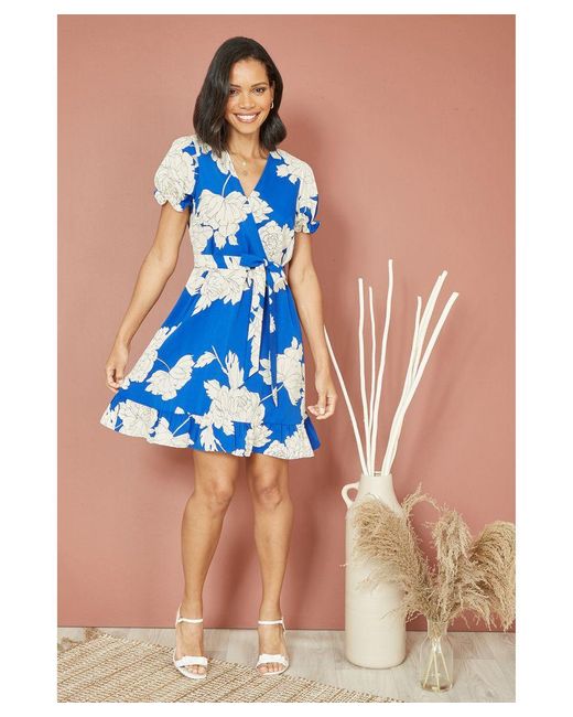 Mela London Blue Blossom Print Wrap Dress With Puff Sleeves