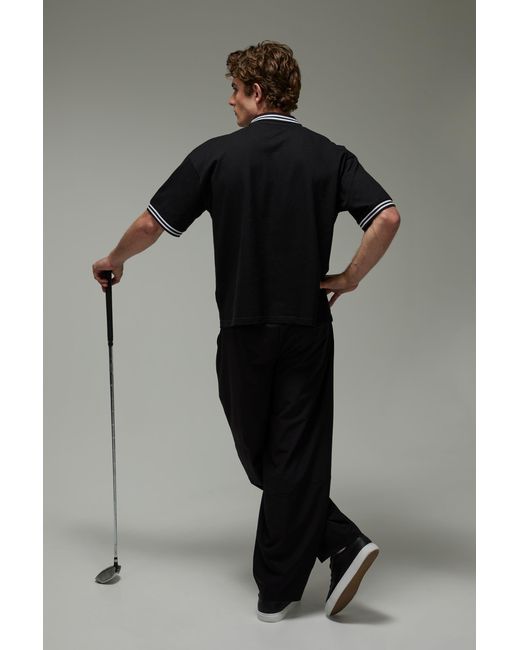 BoohooMAN Black Active Tricot Pique Oversized Fit Golf Polo for men