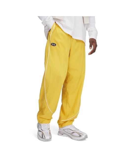 Under Armour Yellow Solid Patterned Track Pants for men