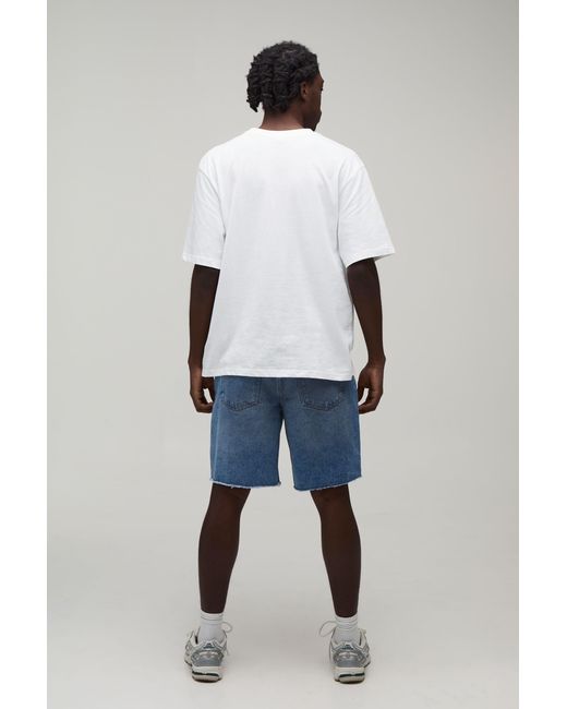 BoohooMAN Blue Relaxed Fit Ripped Washed Denim Shorts for men