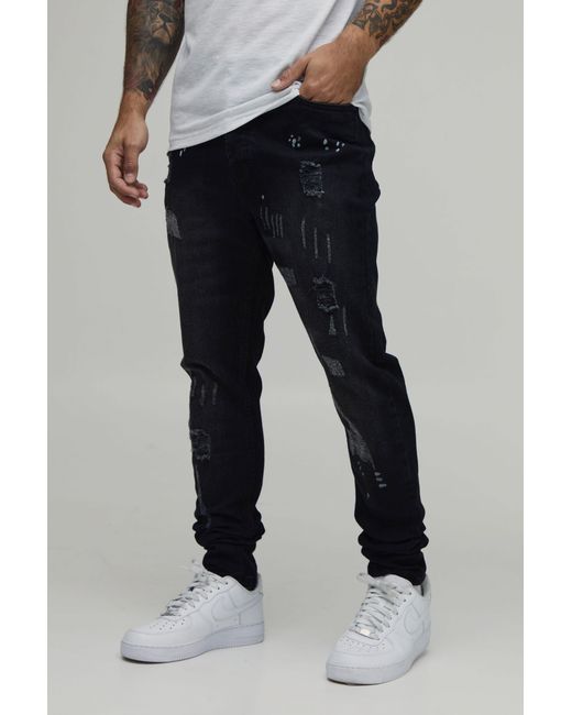 BoohooMAN Black Skinny Stretch All Over Rip & Repair Paint Splatter Jeans for men