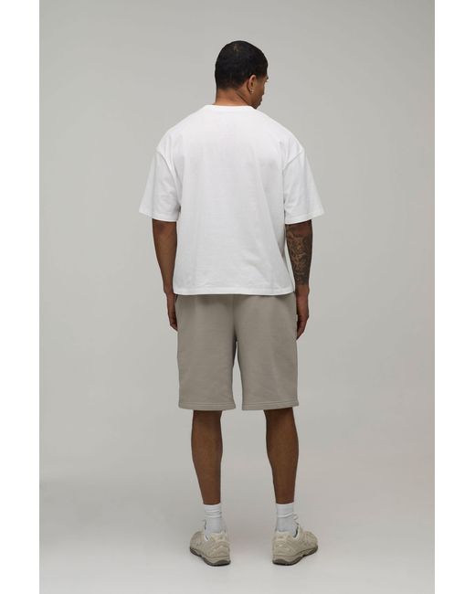 BoohooMAN Natural Baggy Fit Spray Wash Piping Jersey Short for men