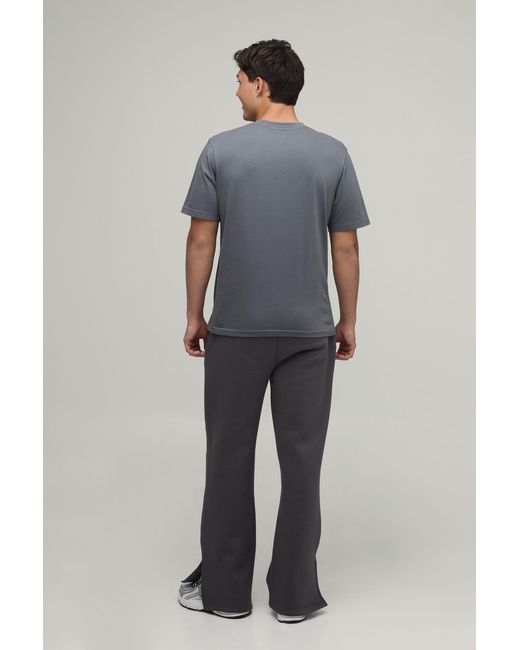BoohooMAN Black Baggy Flared Fit Split Hem Joggers for men