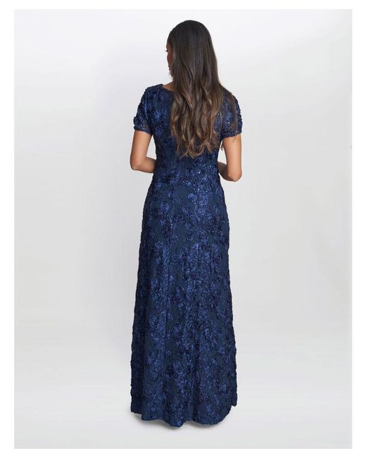 Gina Bacconi Blue Nancy Gown With Rosette Sequin Detail