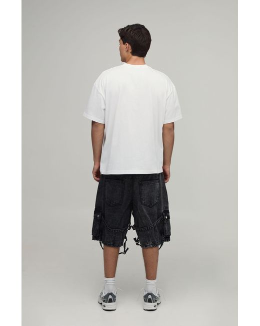 BoohooMAN Black Parachute Extreme Washed Multi Cargo Ripped Shorts for men