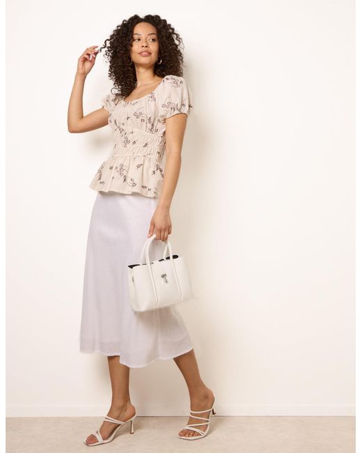 Blue Vanilla Natural Embroidery Peplum Blouse