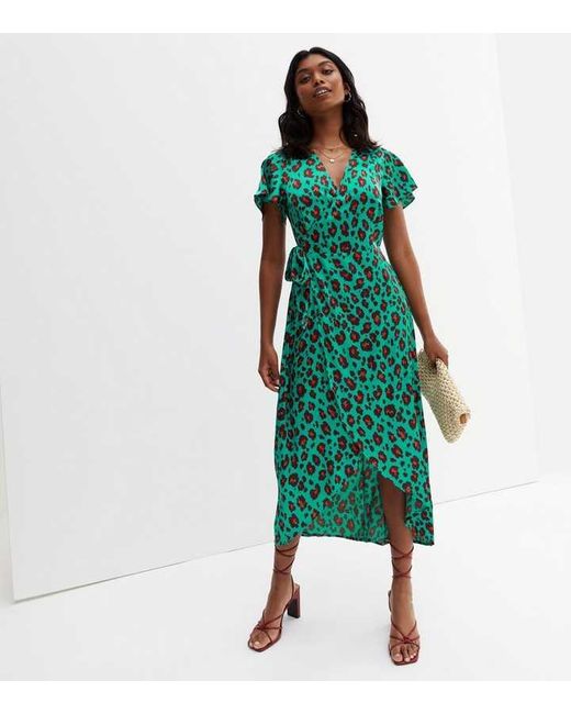 Gini London Dierenprint Wikkel Midi-jurk in het Green