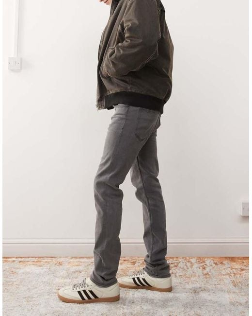 Cheap Monday Gray Sleeze Super Stretch Skinny Jeans for men