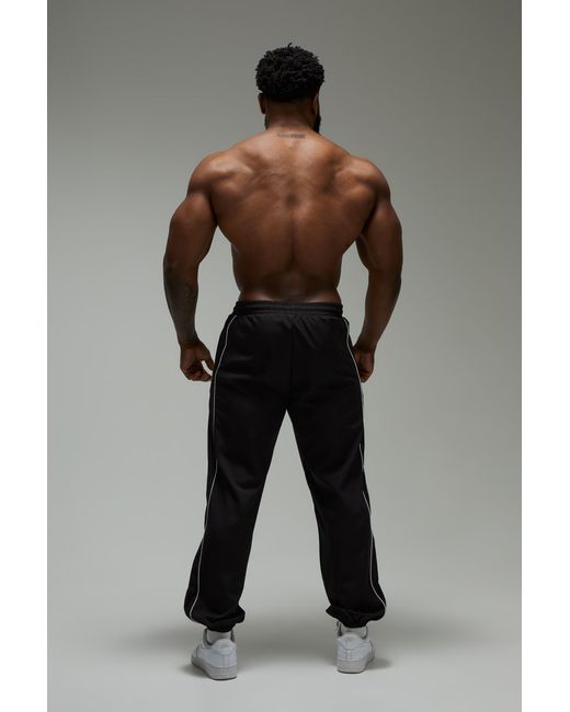 BoohooMAN Black Training Dept Regular Fit Cuffed Woven Joggers for men