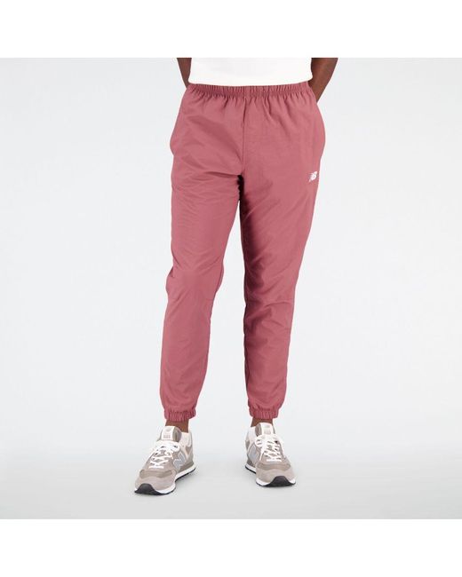 New Balance Sport Essentials Premium Woven Pants In Bourgondië in het White voor heren