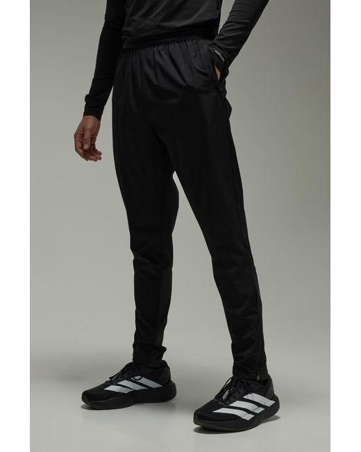 BoohooMAN Black Common Pace Running Ultra Zip Hem Tapered Joggers for men