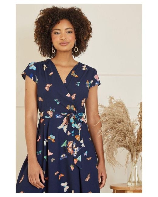 Mela London Blue Butterfly Print Dip Hem Midi Wrap Dress