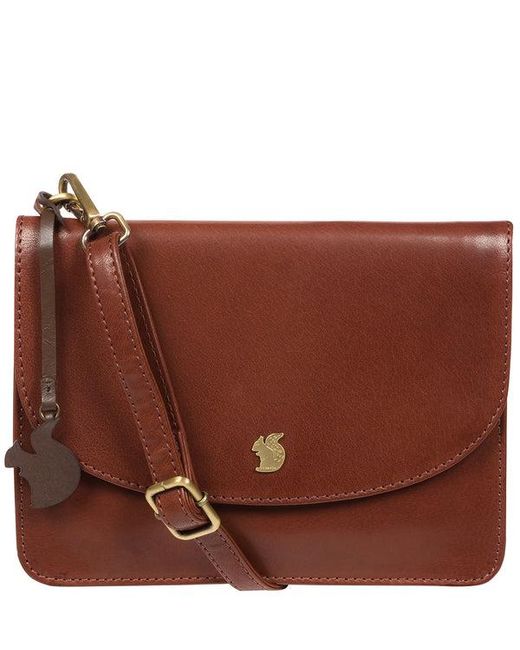 Conkca Brown 'Cara' Conker Leather Cross Body Clutch Bag