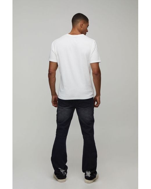 BoohooMAN Black Ripped Zip Hem Slim Stacked Flared Jeans for men