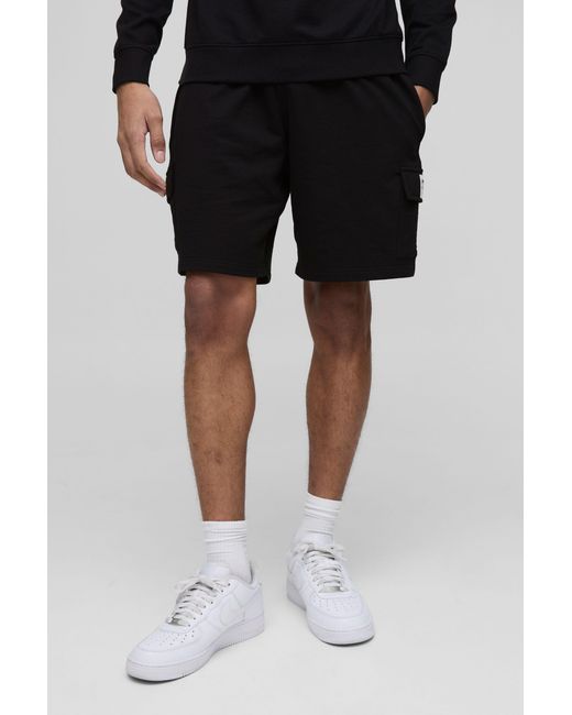 BoohooMAN Black Lightweight Basic Relaxed Mid Length Label Cargo Shorts for men