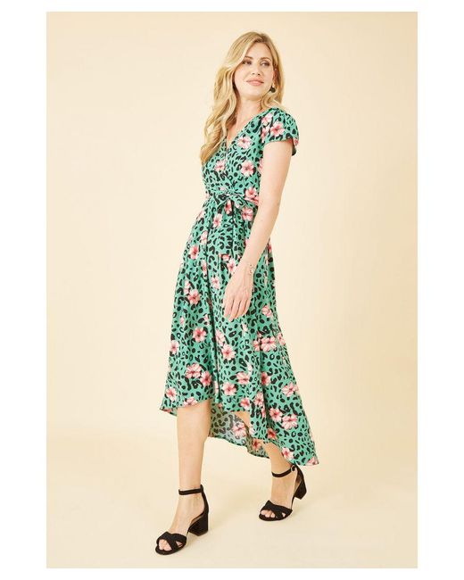 Mela London Blue Animal Print Dipped Hem Wrap Dress