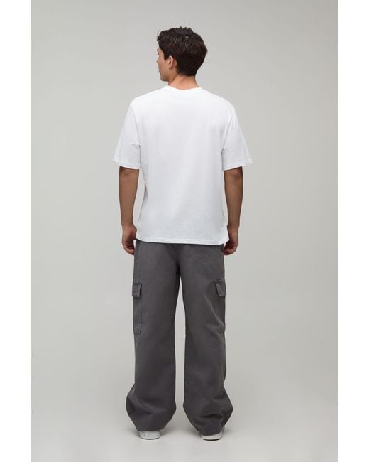 BoohooMAN Black Wide Fit Half & Waistband Cargo Pocket Washed Twill Trouser for men