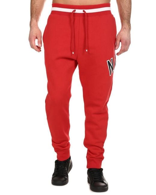 red nike air joggers
