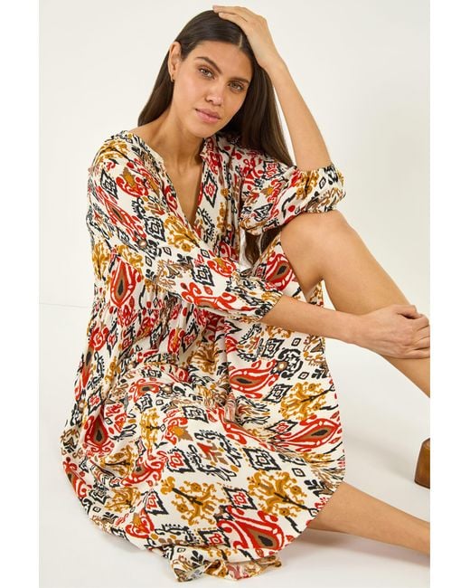 Roman Orange Abstract Print Empire Waist Dress