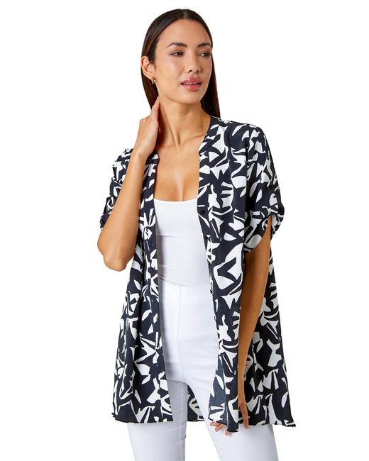 Roman Blue Abstract Print Dipped Hem Shirt