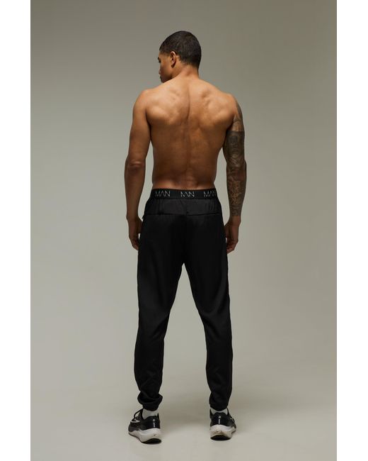 BoohooMAN Black Active Performance Tapered Stretch Jogger for men