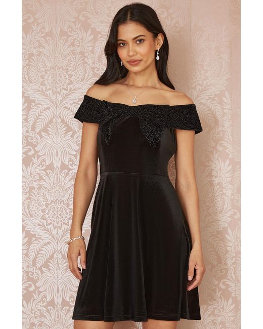 Mela London Black Velvet Skater Dress With Sparkle Bow Neckline