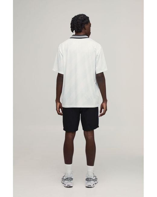 BoohooMAN Black Relaxed Fit Colour Block Mid Length Nylon Shorts for men