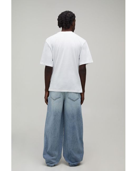 BoohooMAN Blue Fade Wash Extreme Distressed Baggy Fit Jeans for men