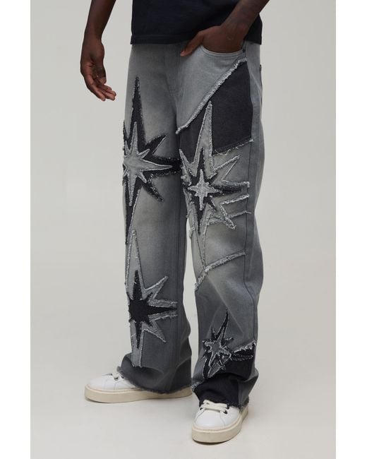 BoohooMAN Black Star Cut & Sew Relaxed Fit Jeans for men