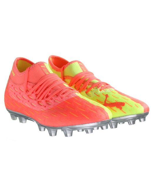 Peach football boots top