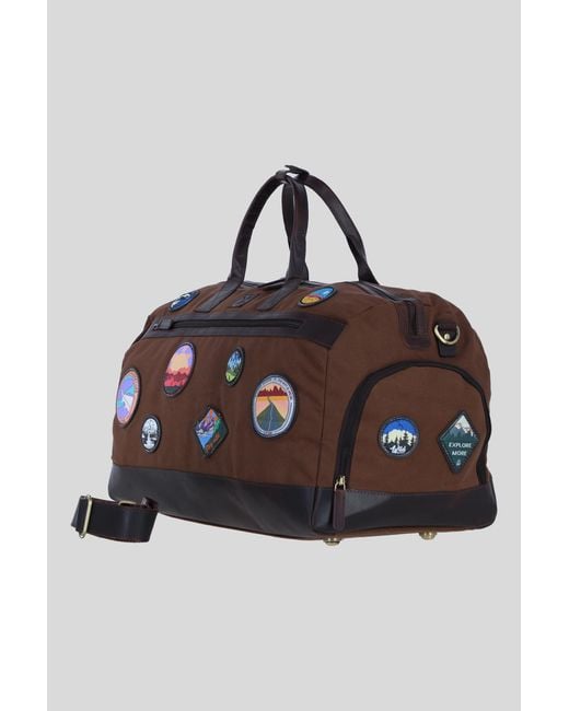 Fenland Sheepskin Brown Heritage Canvas Travel Holdall With Adventure Patches for men