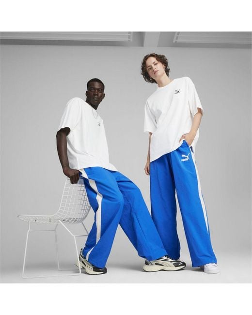 Blue puma track pants best sale