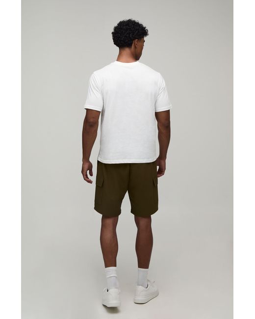BoohooMAN Green Relaxed Fit Elasticated Technical Stretch Cargo Shorts for men