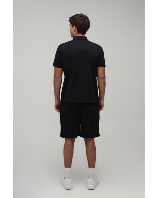 BoohooMAN Black Seam Detail Regular Fit 1/4 Zip Polo & Short Set for men