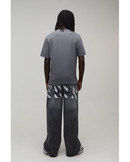 BoohooMAN Black Zebra Applique Baggy Fit Jeans for men