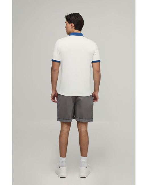 BoohooMAN Blue Slim Panelled Zip Neck Interlock Polo for men