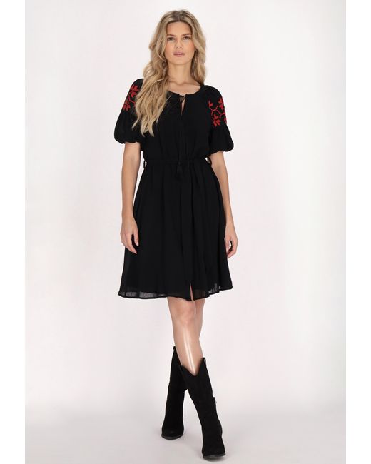 Usha Jurk in het Black