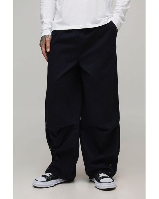 BoohooMAN Black Tall Elasticated Waist Oversized Hem Popper Trousers for men